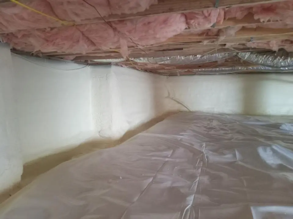 Crawl space encapsulation with closed-cell spray foam for Commercial Roof Restoration in Bridgton